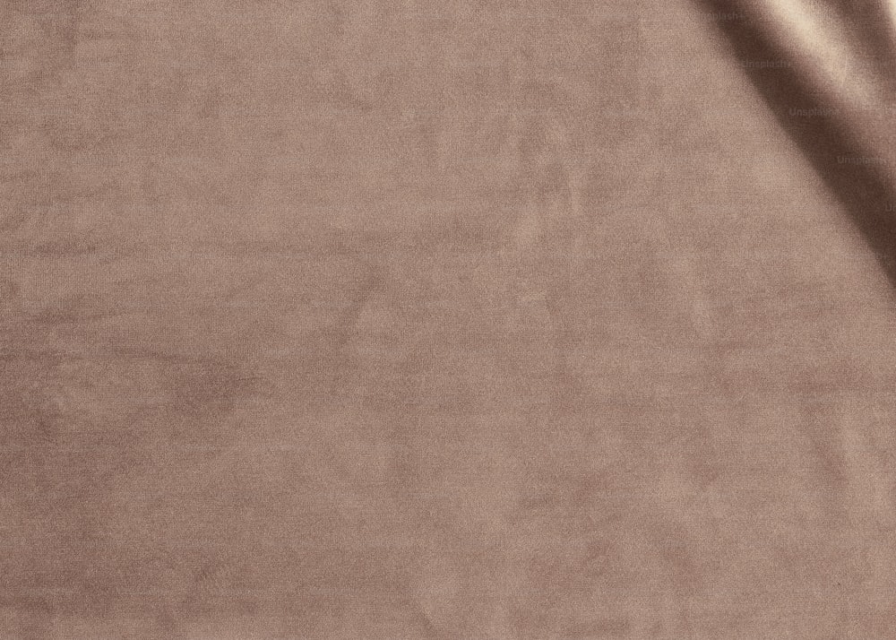 a close up of a tan colored cloth