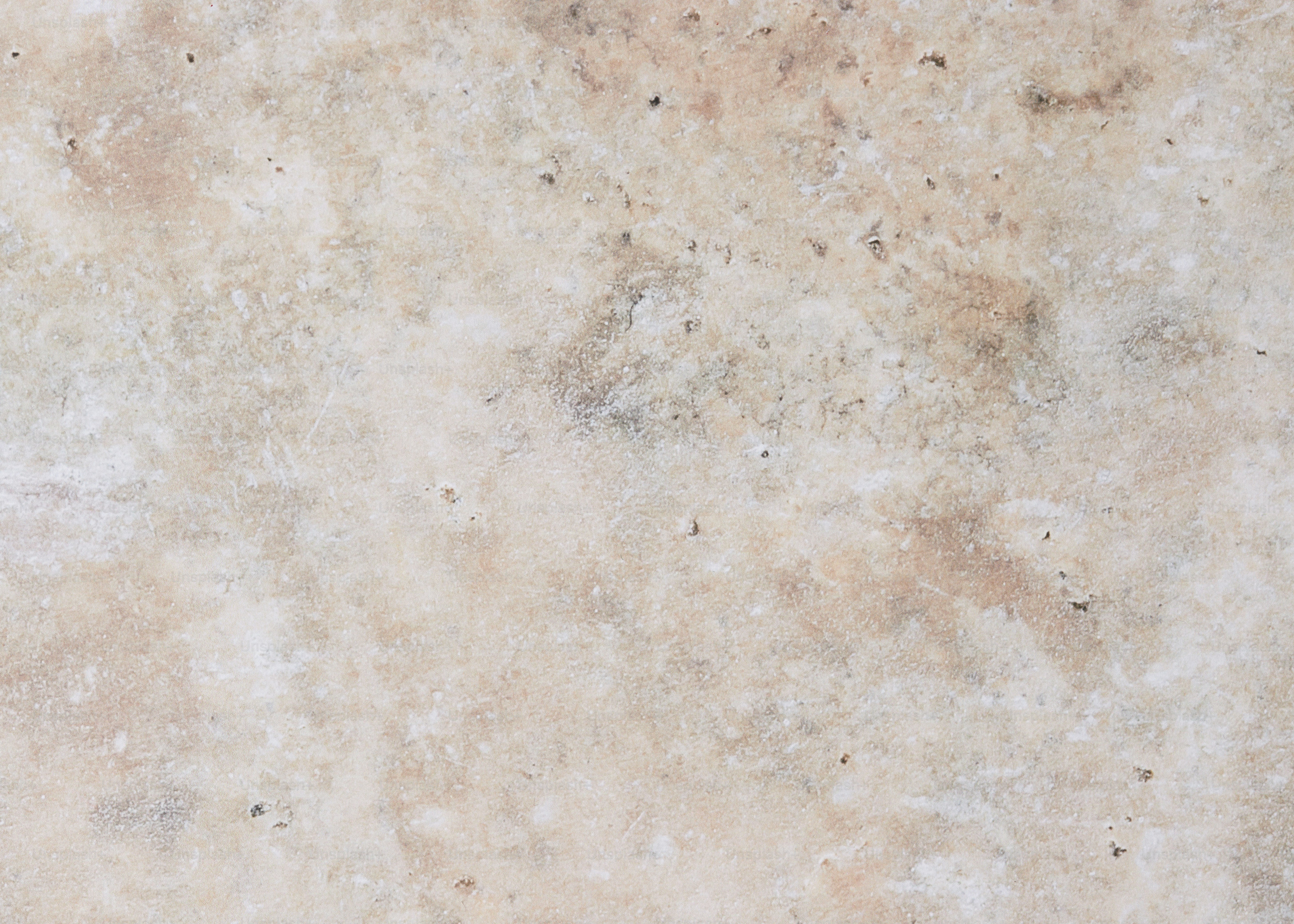 a close up of a white marble surface