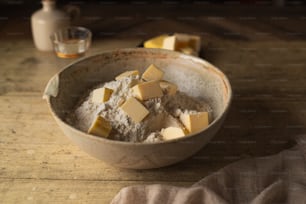 a bowl of food that is on a table