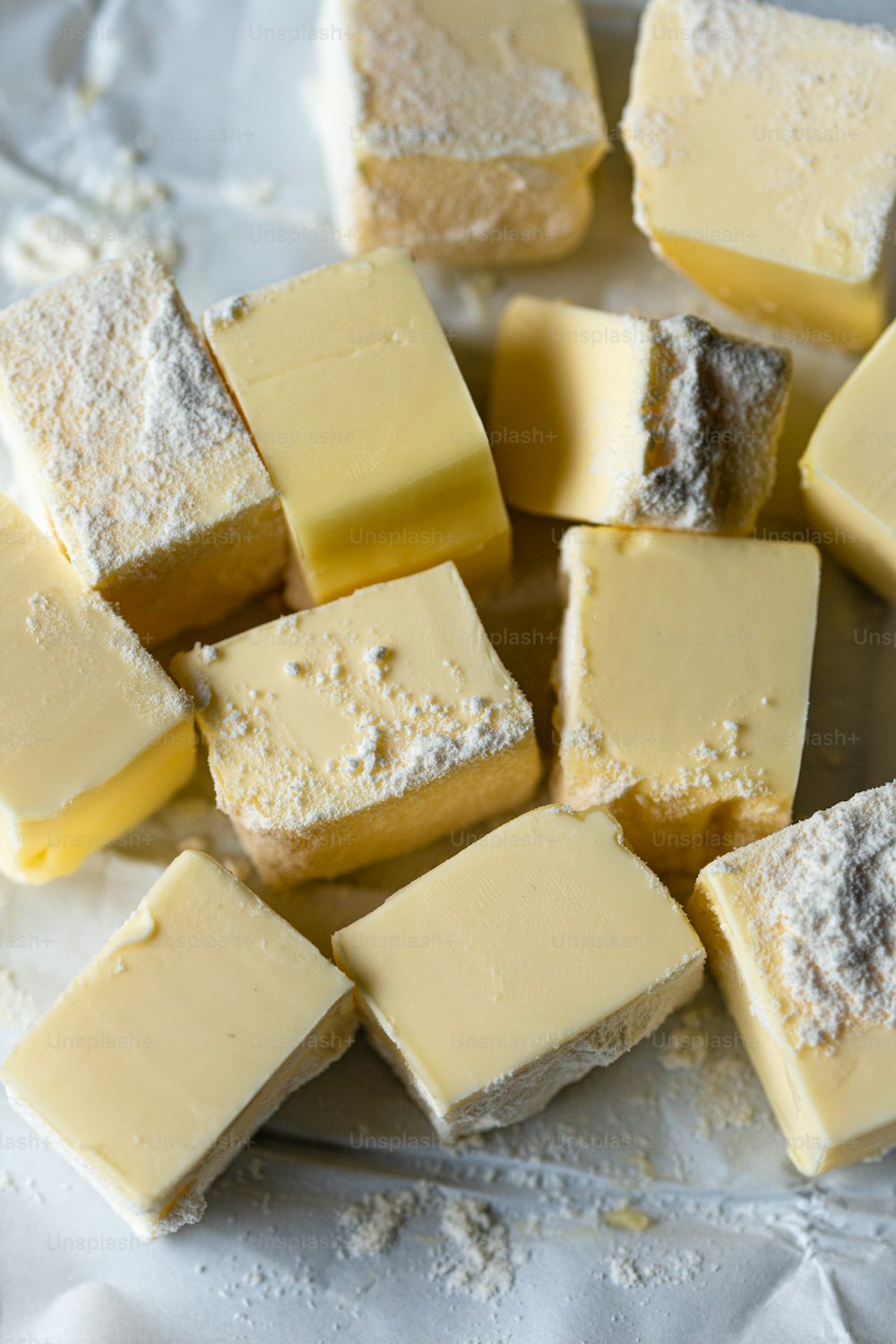 a bunch of different types of cheese on a plate