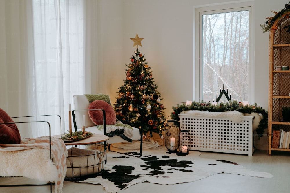 a living room filled with furniture and a christmas tree