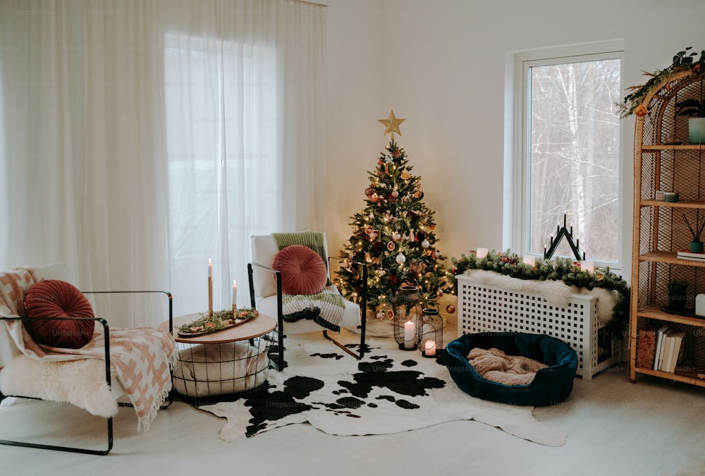 a living room filled with furniture and a christmas tree