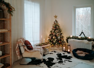 a living room with a christmas tree in the corner