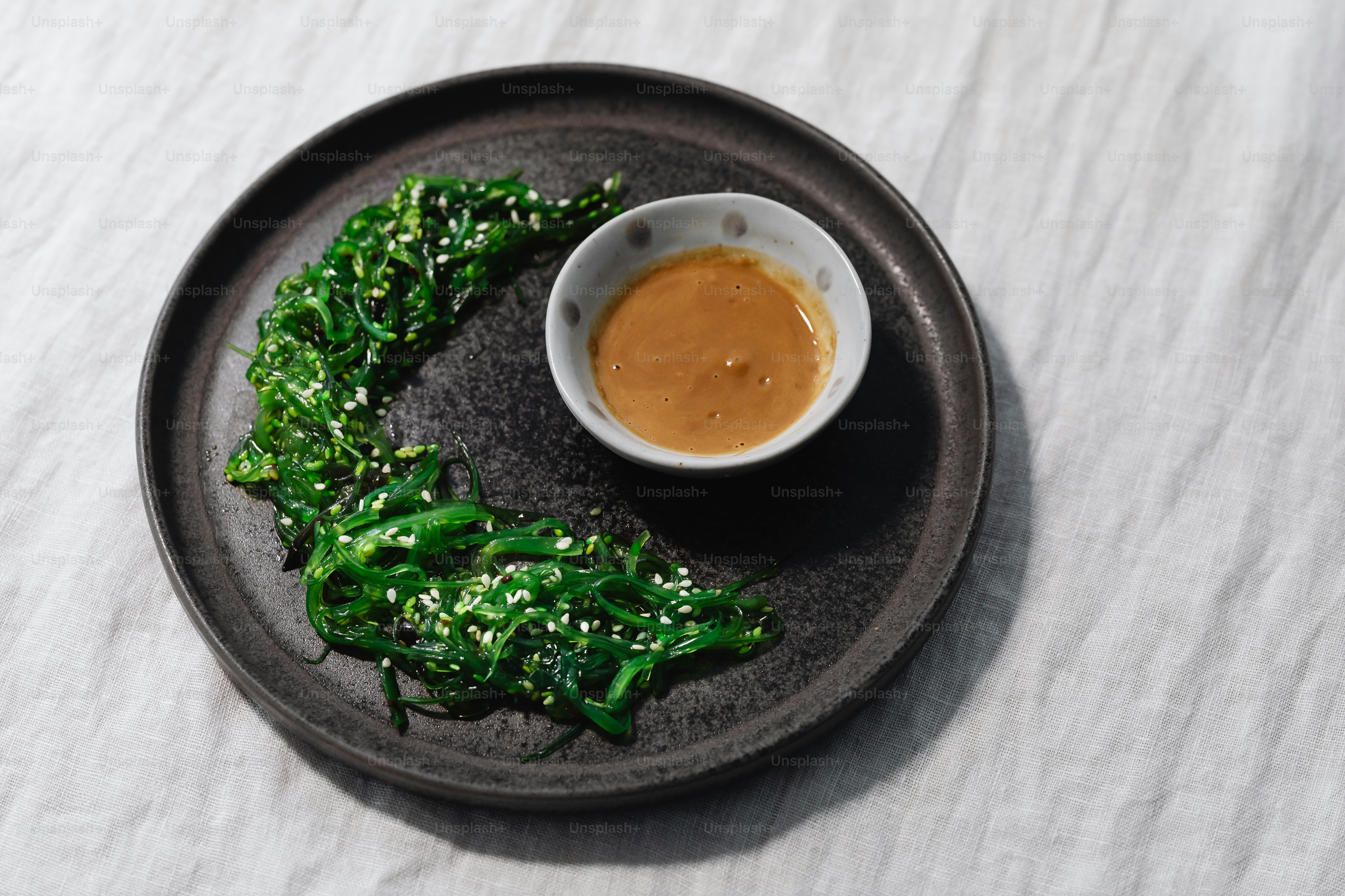 a plate of food with sauce on it