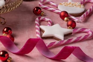 a table topped with cookies and candy canes