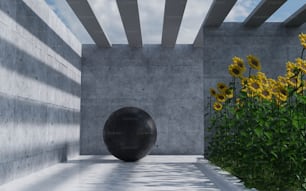 a large black ball sitting in the middle of a garden