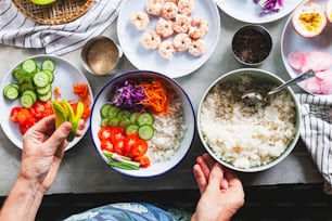 a table topped with plates of food and bowls of vegetables