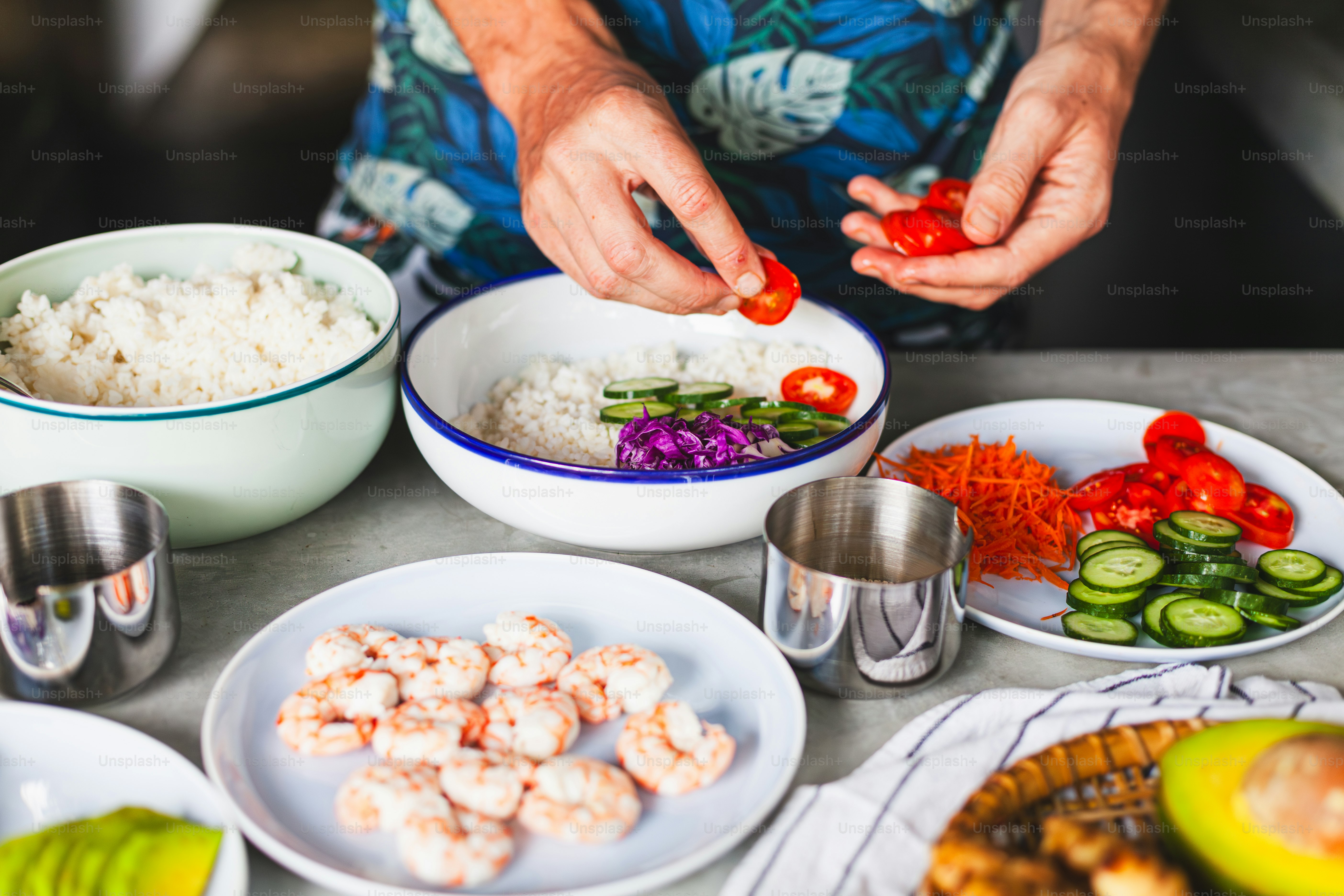 a person preparing a meal on a table