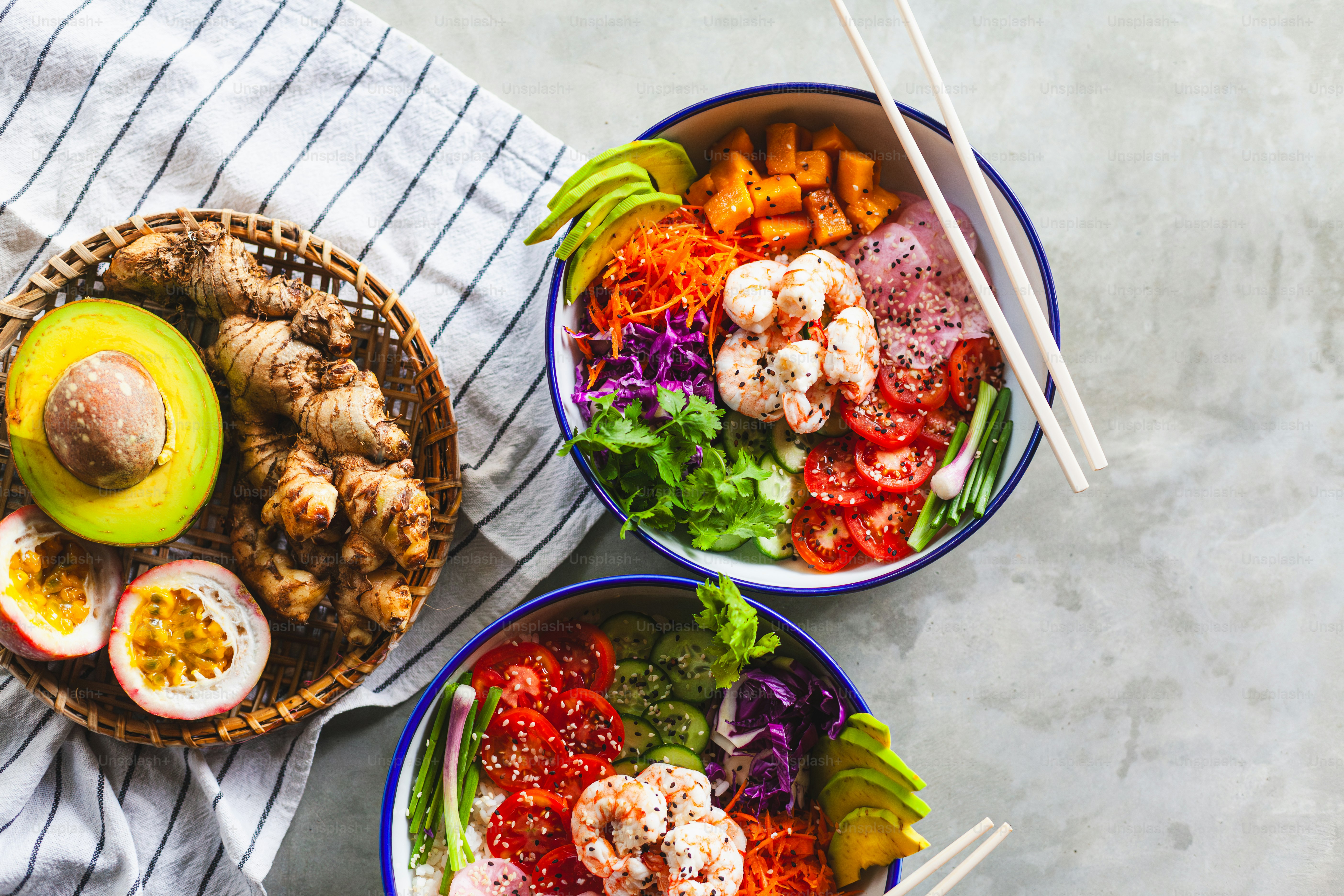 a couple of bowls of food on a table