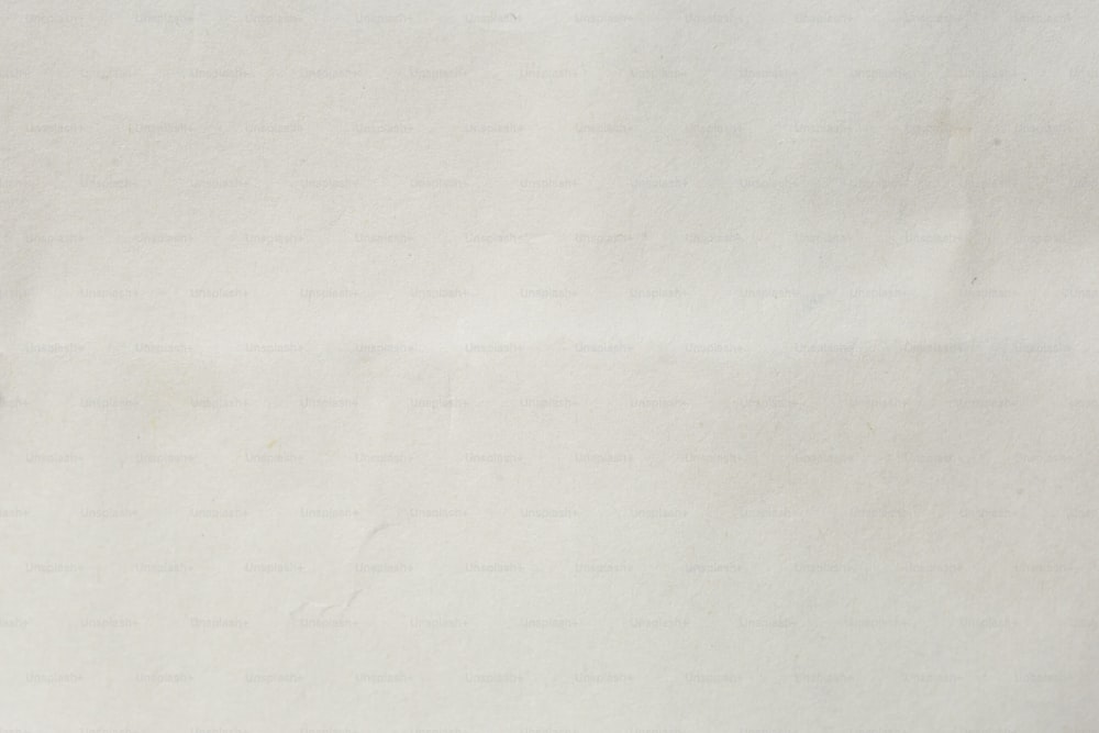 a close up of a piece of white paper
