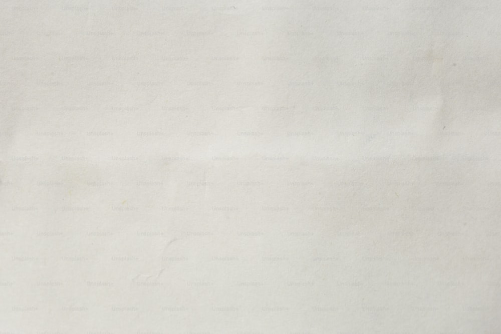 a close up of a piece of white paper