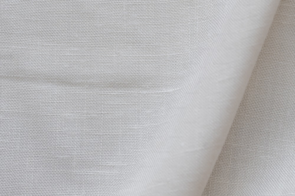 a close up view of a white fabric