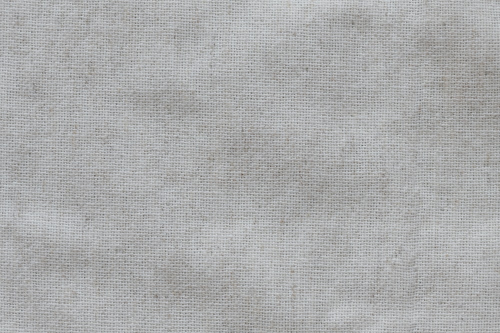 a close up of a white fabric texture