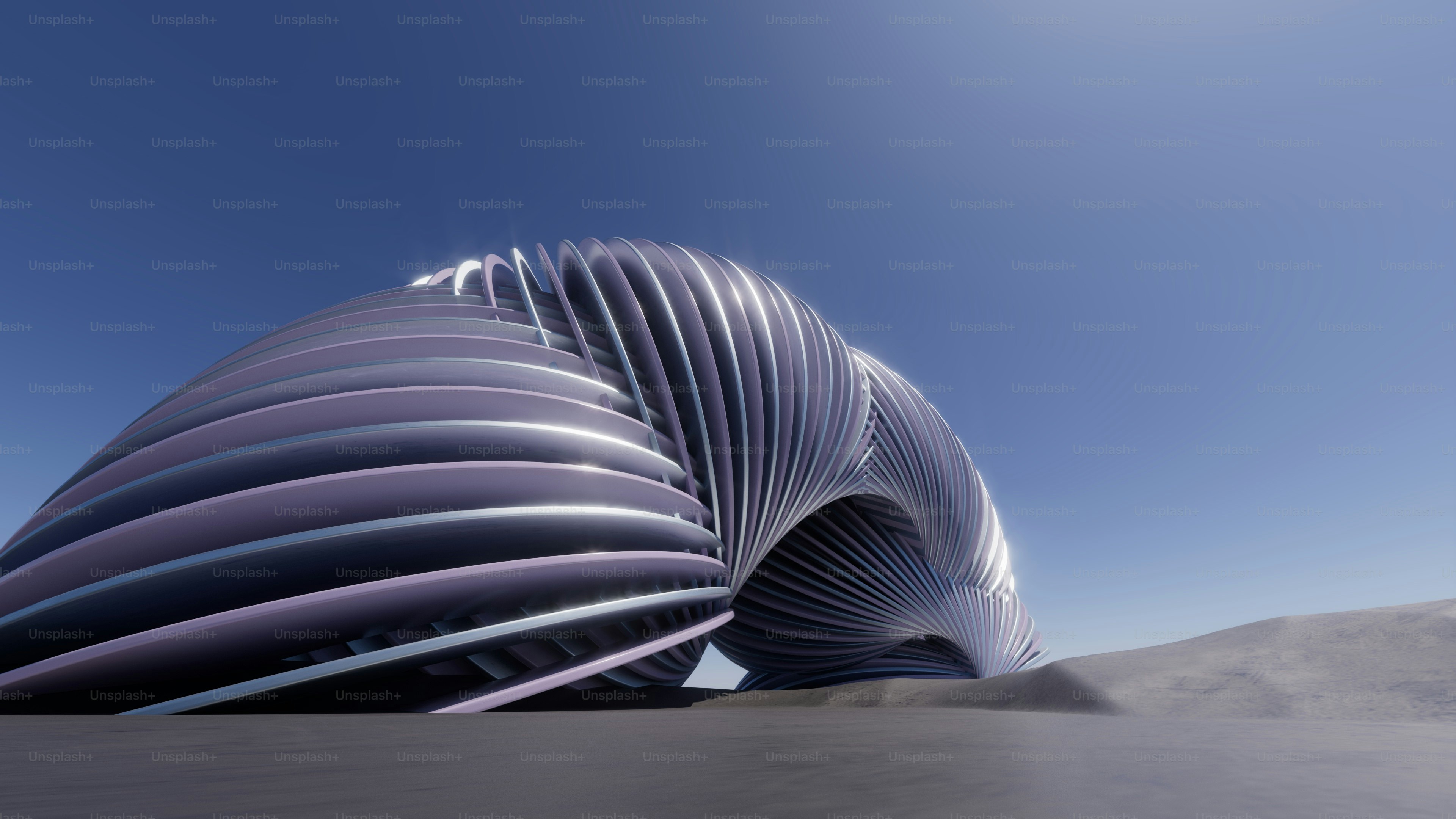 a futuristic building in the middle of a desert