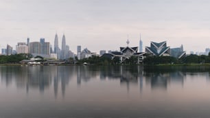 a large body of water with a city in the background