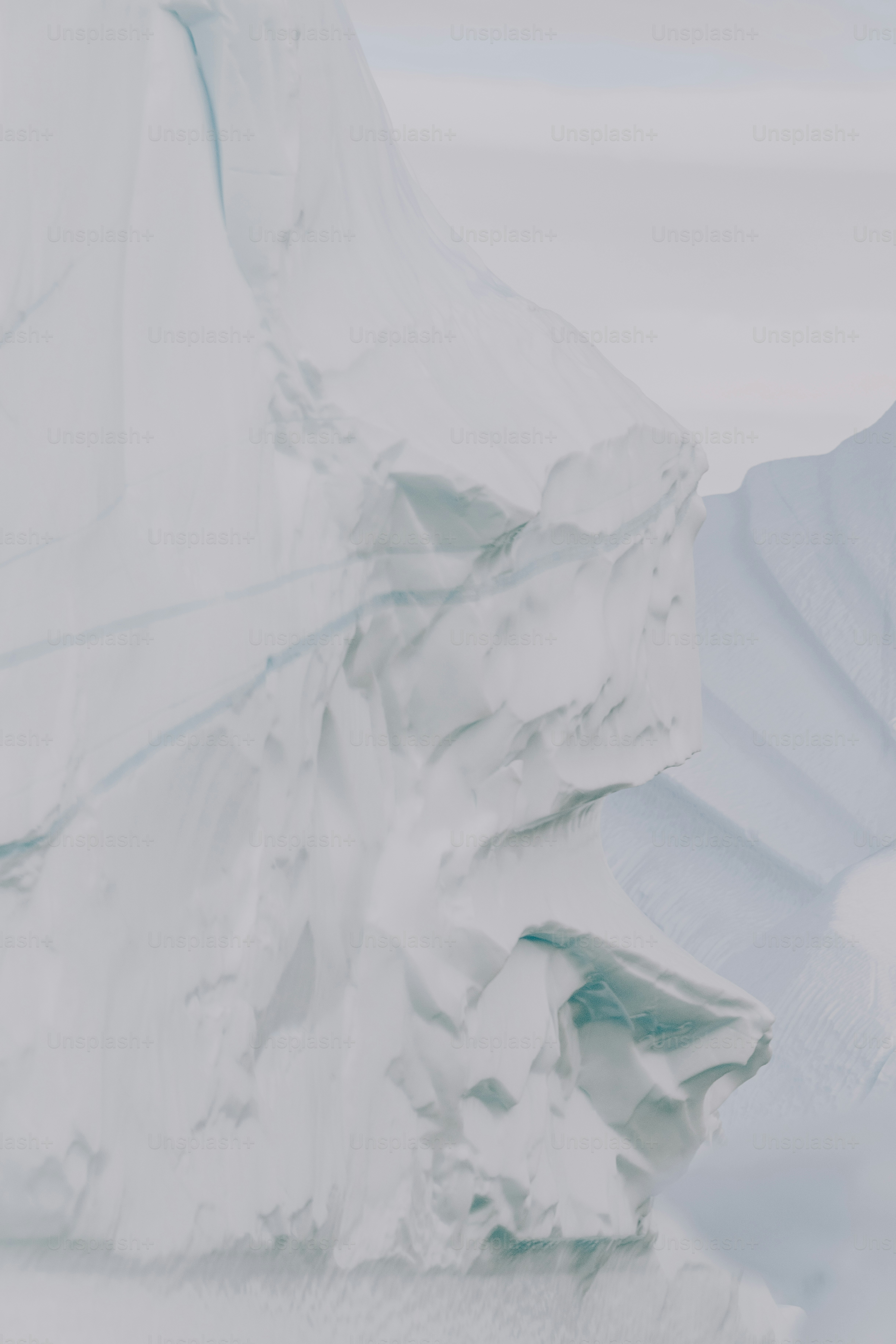 a man is skiing down a snowy hill