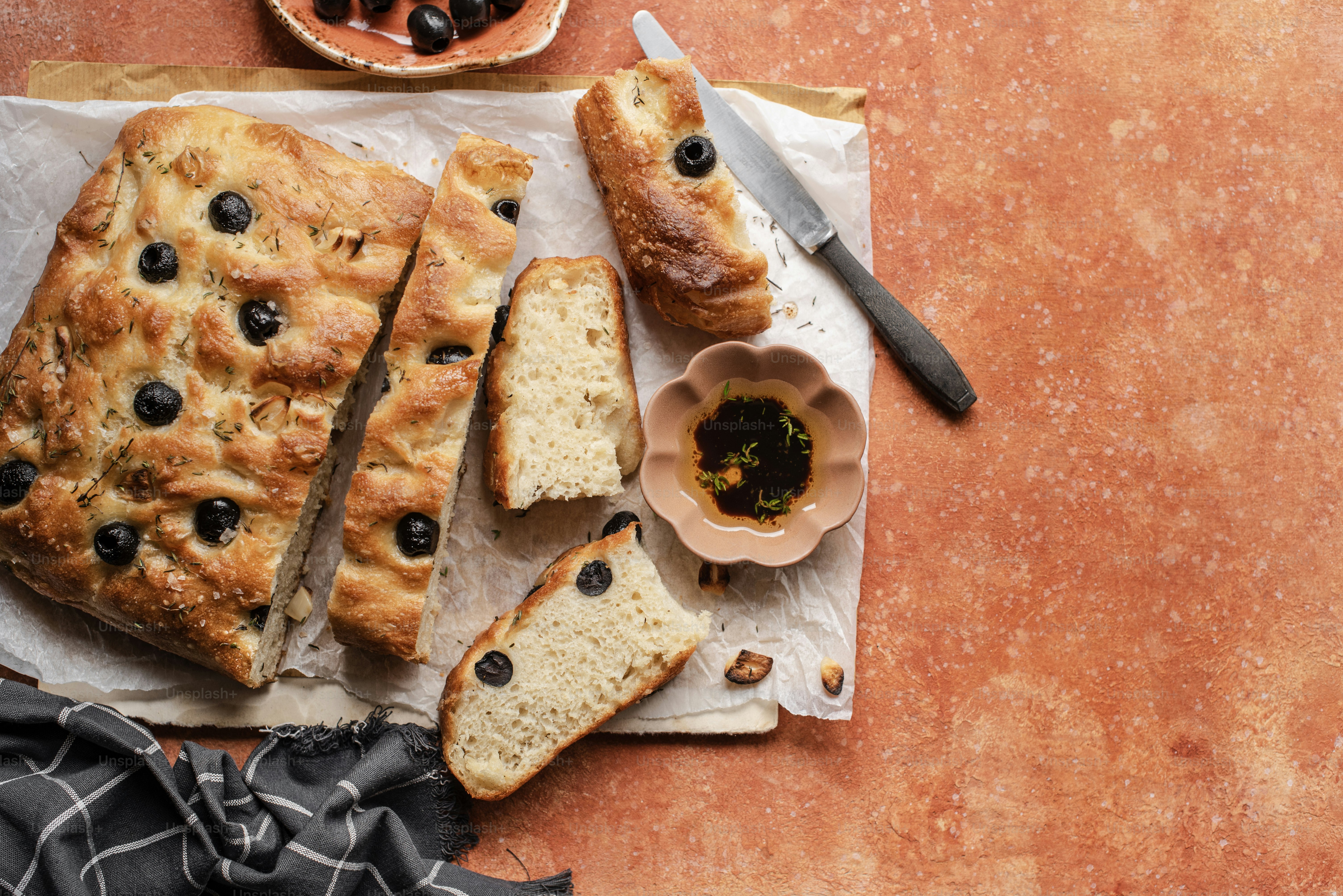 a loaf of bread sitting on top of a cutting board