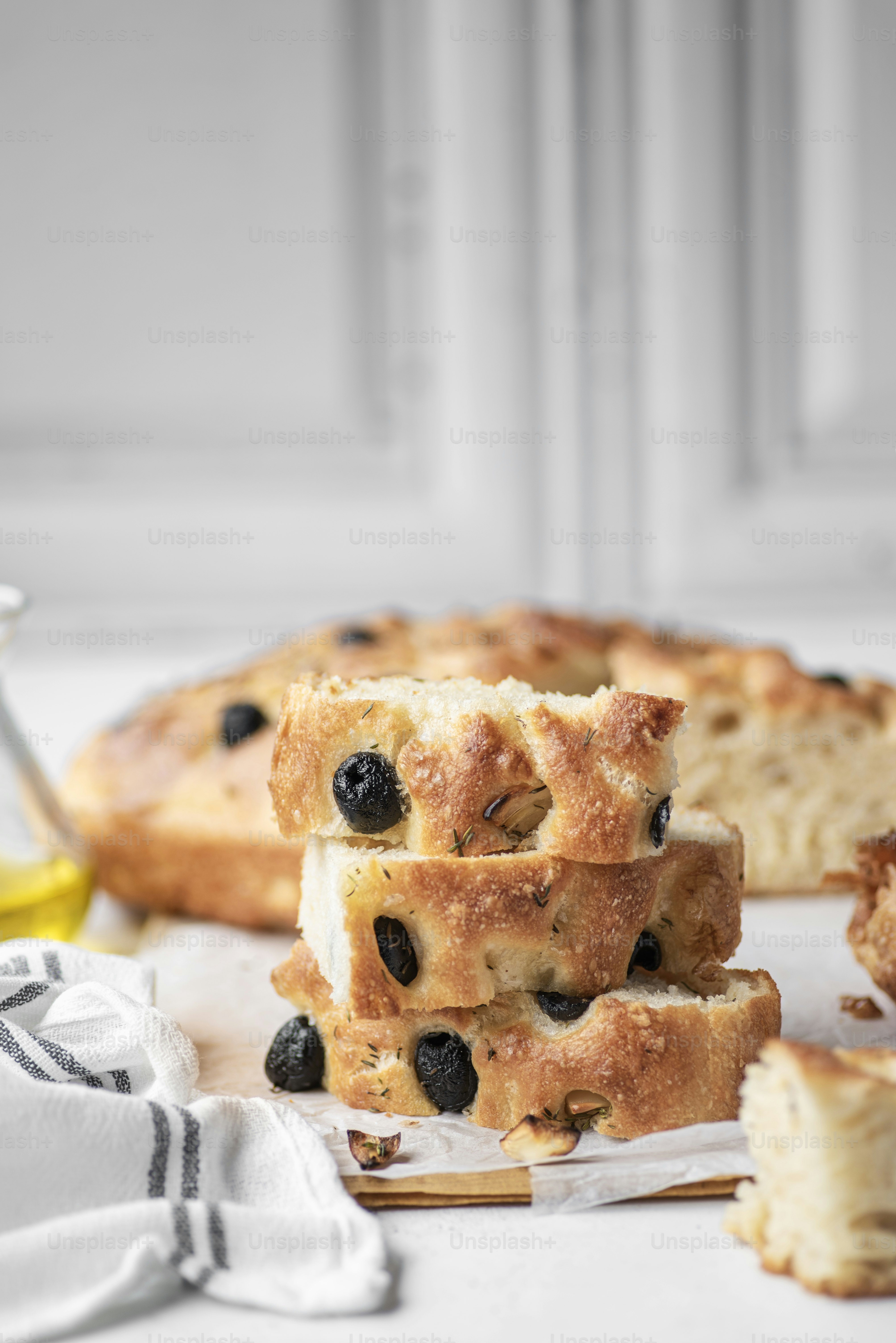 a stack of blueberry bread sitting on top of a table