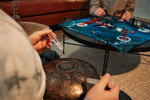 two people playing a game on a table