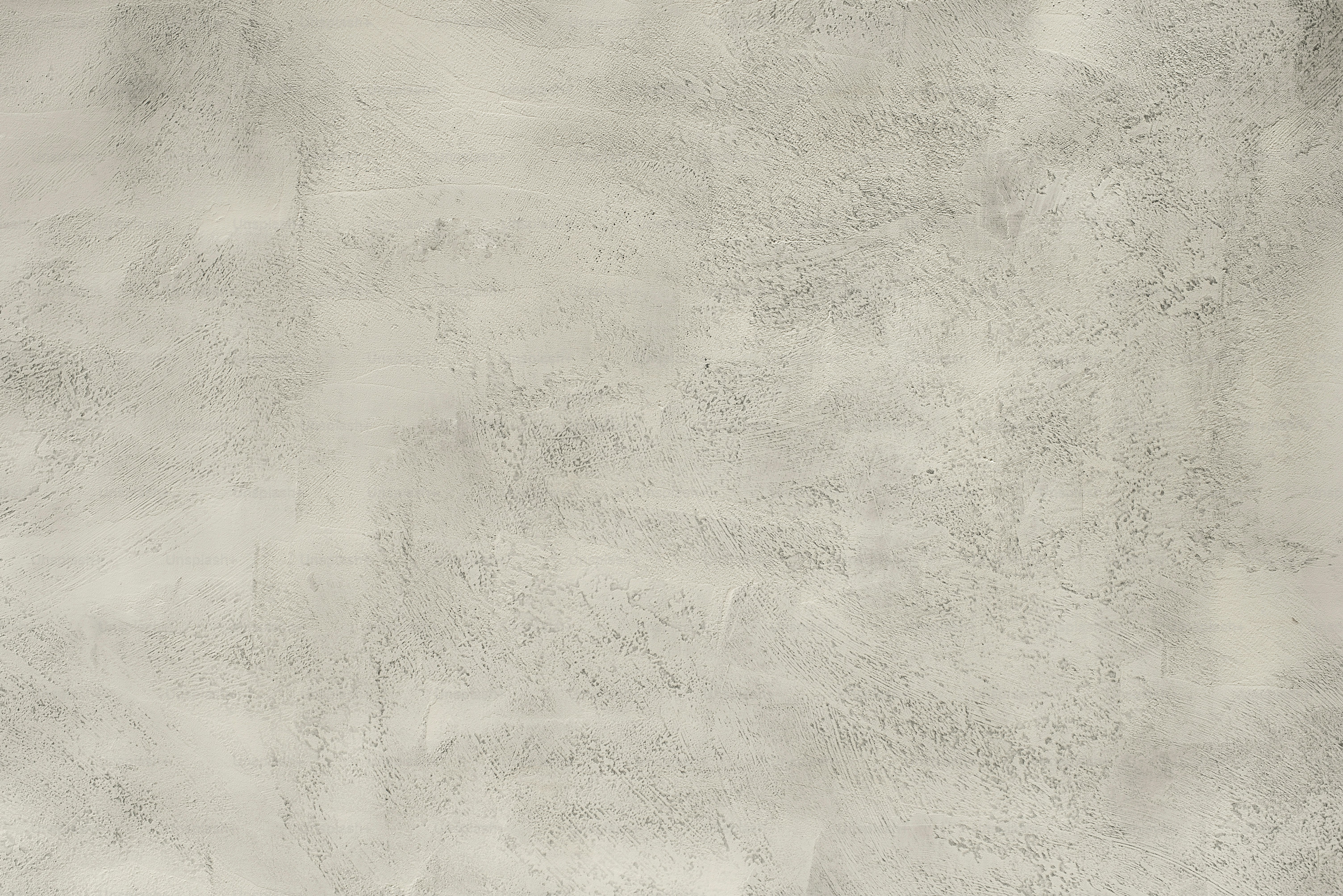 a black and white photo of a concrete wall