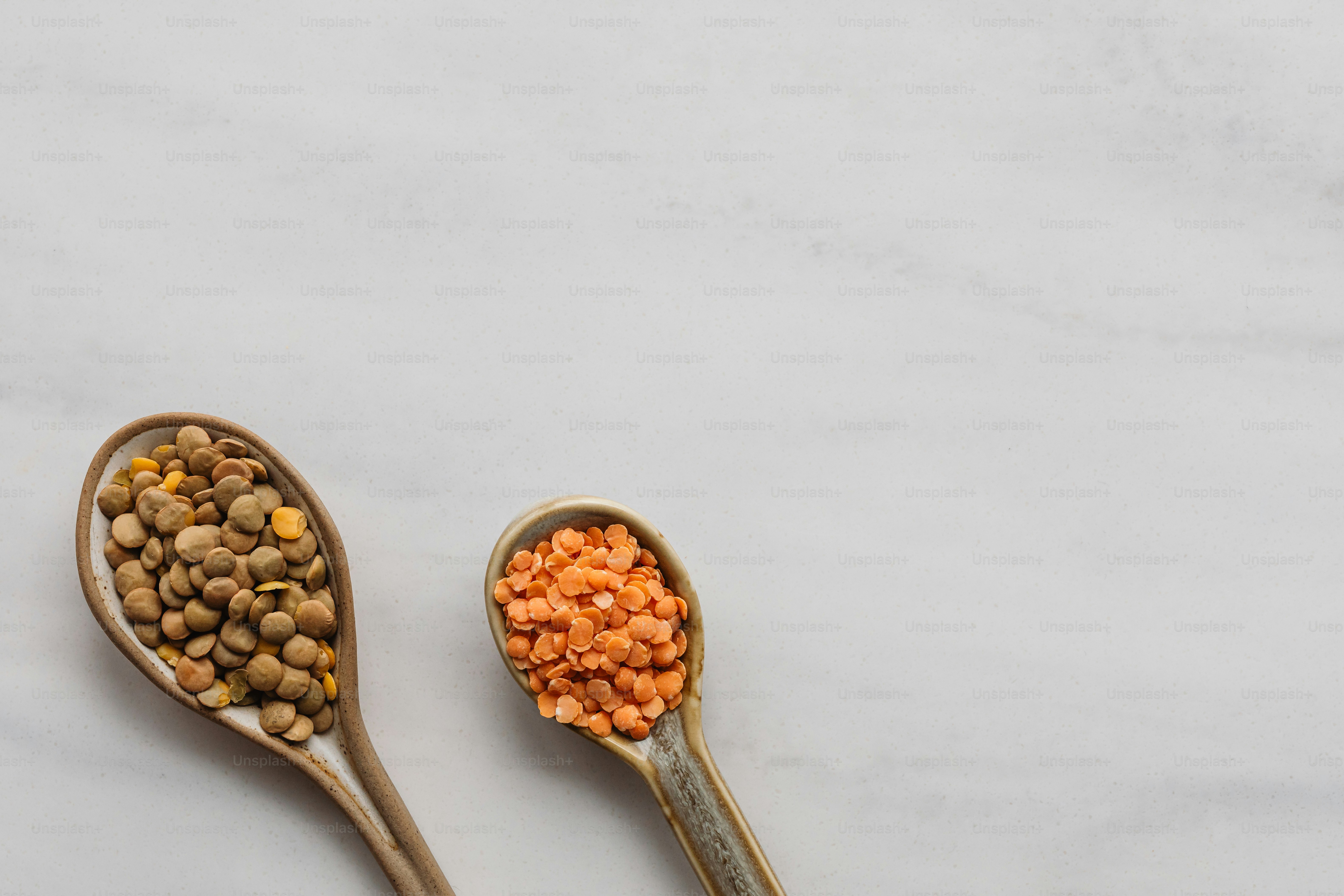 A couple of spoons filled with different types of food photo – Food ...