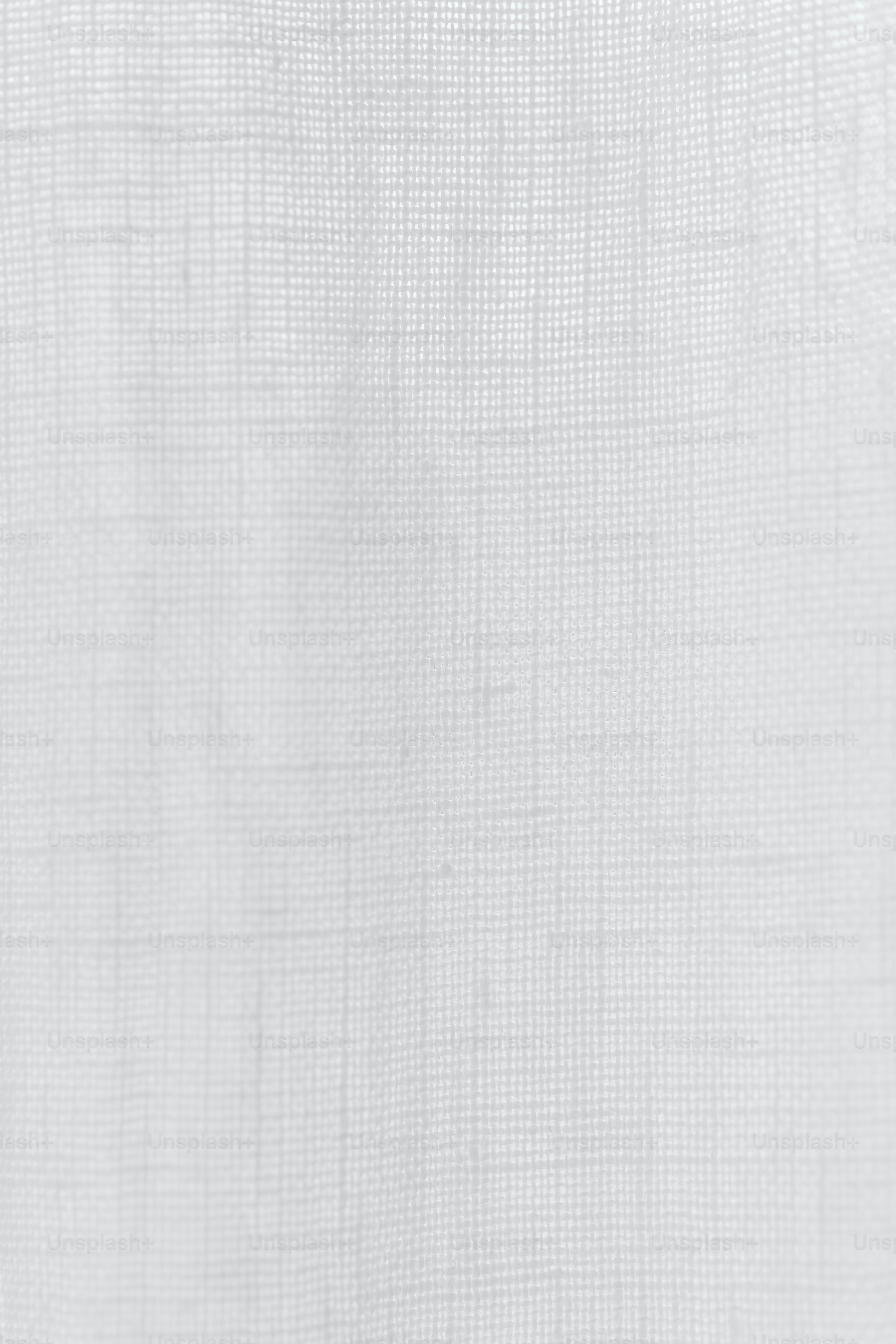 A close up of a white curtain with a white background photo – Wedding ...