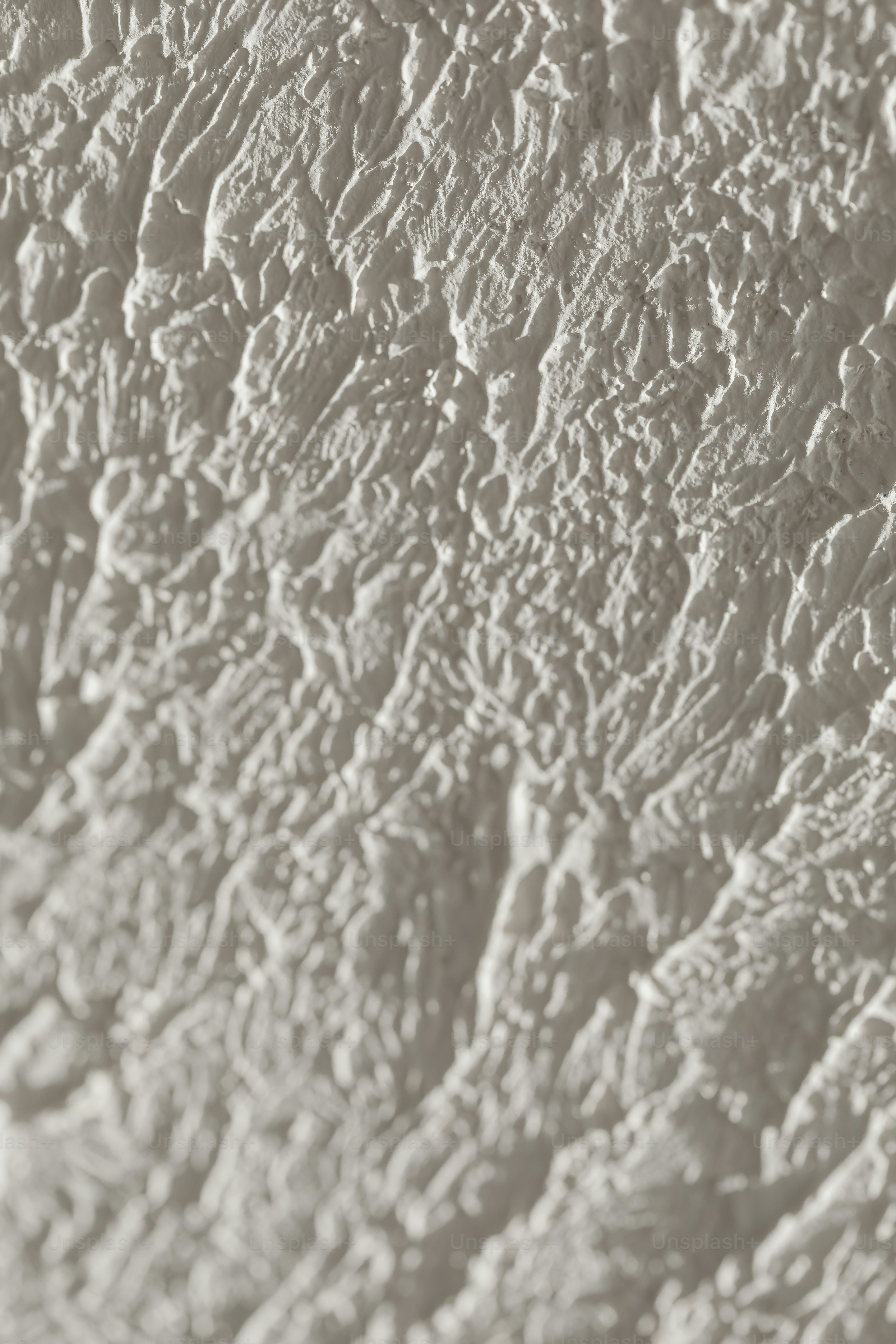 a black and white photo of a textured surface