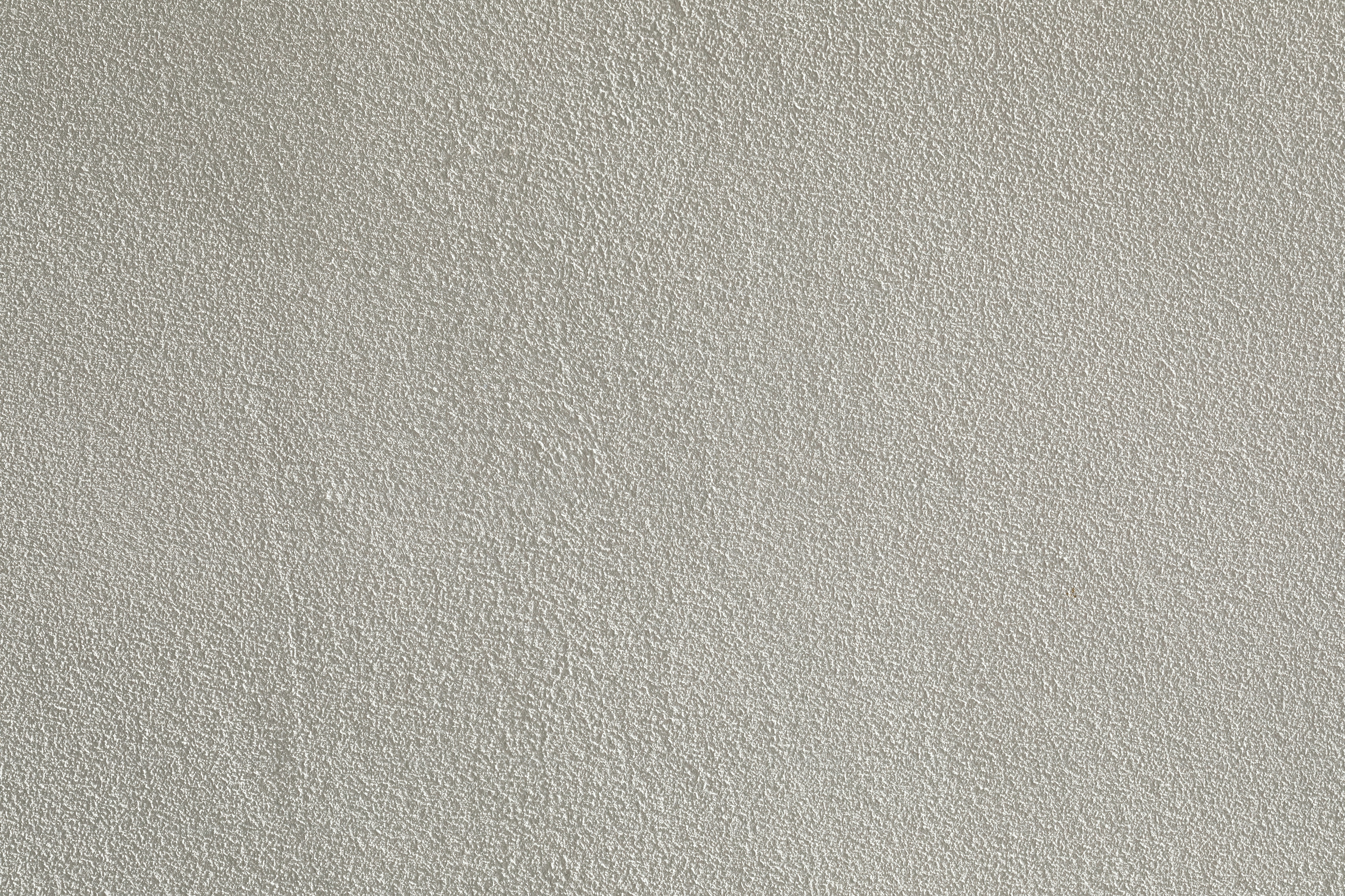 a black and white photo of a white wall