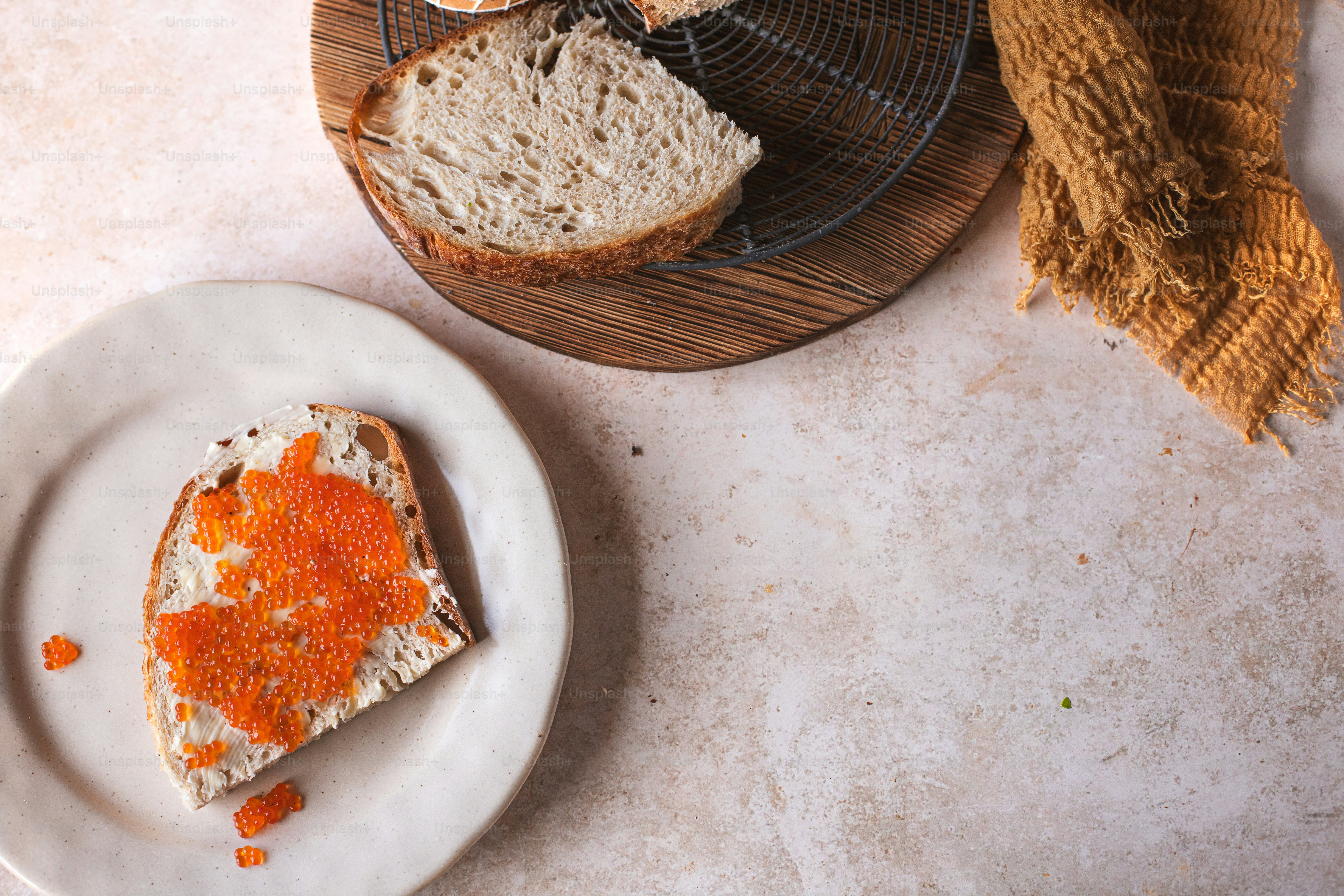 a piece of bread sitting on top of a white plate