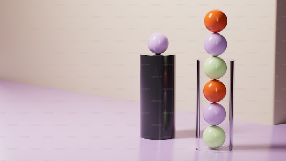 a couple of vases sitting on top of a purple table
