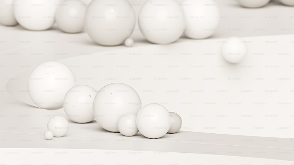 a group of white balls sitting on top of a table