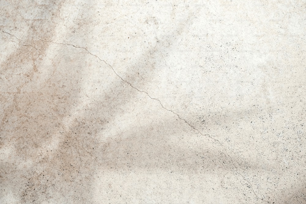 a close up of a white marble surface