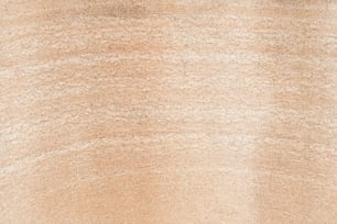 Eine Nahaufnahme eines braunen Teppichs