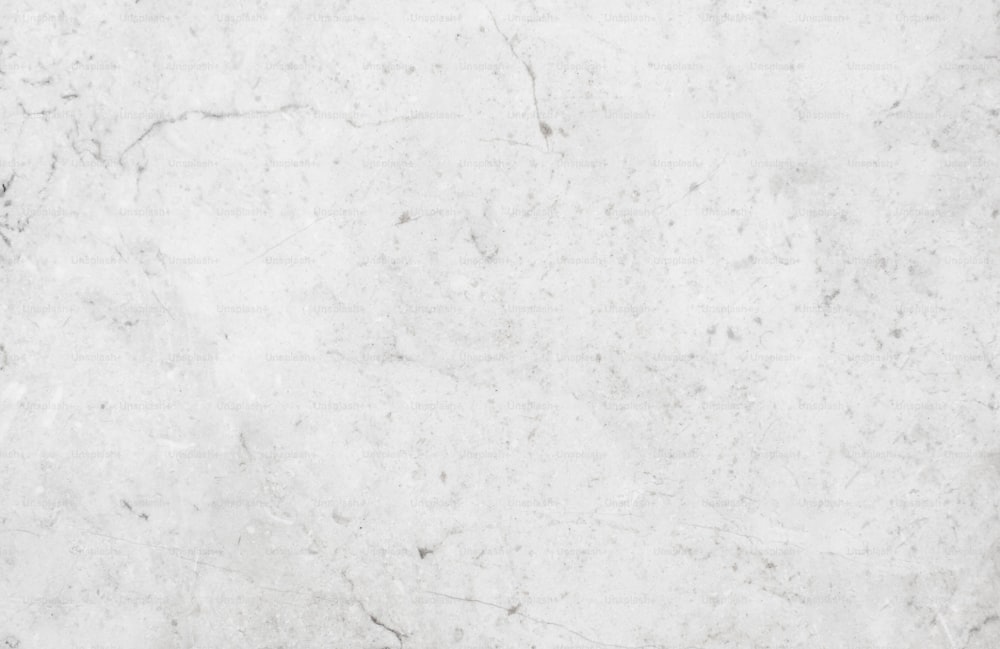 a white marble background with a black border