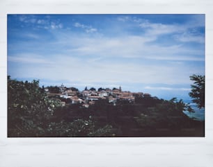 a picture of a town on a hill