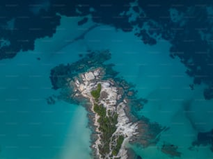 an aerial view of an island in the ocean