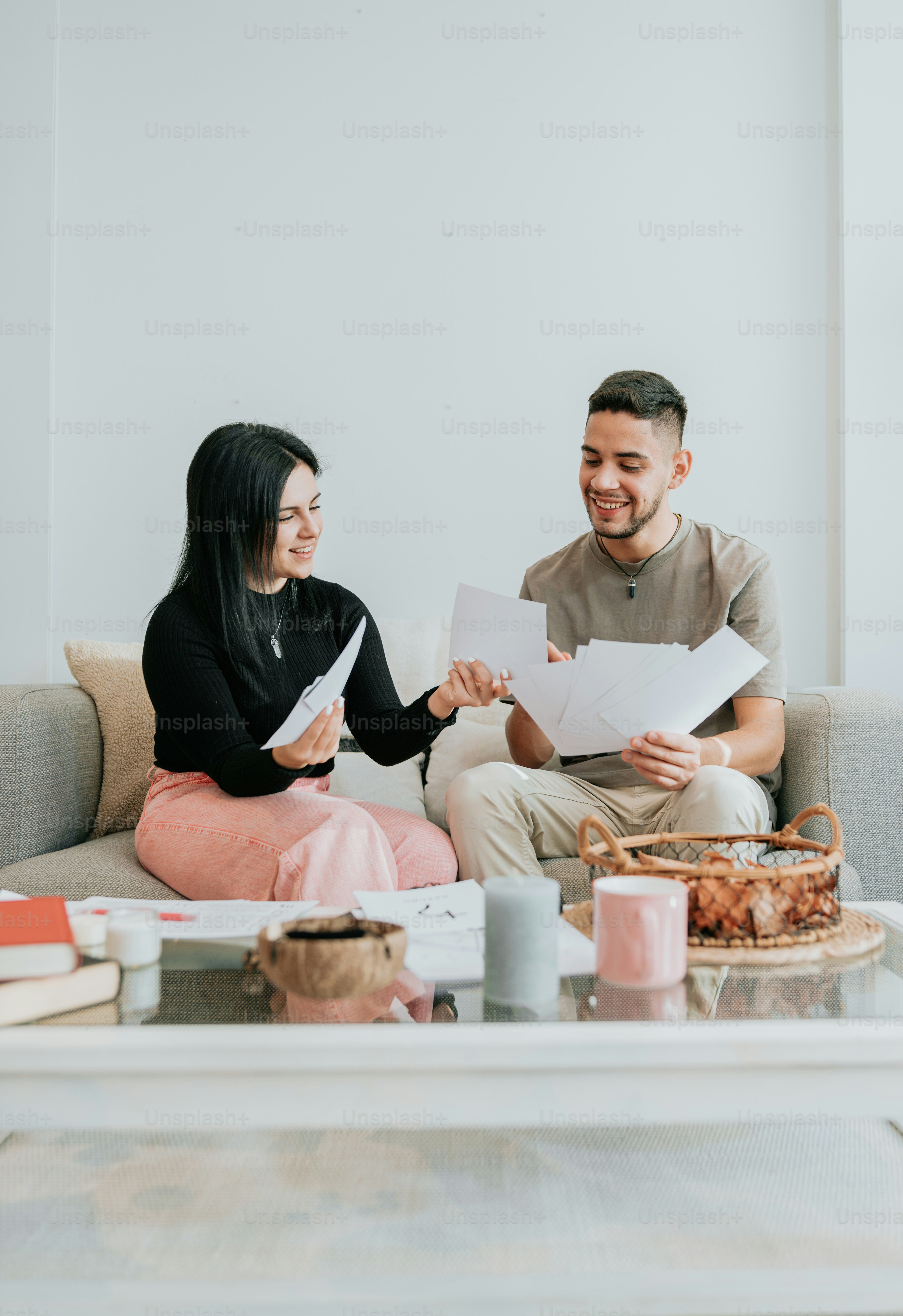 a man and a woman sitting on a couch