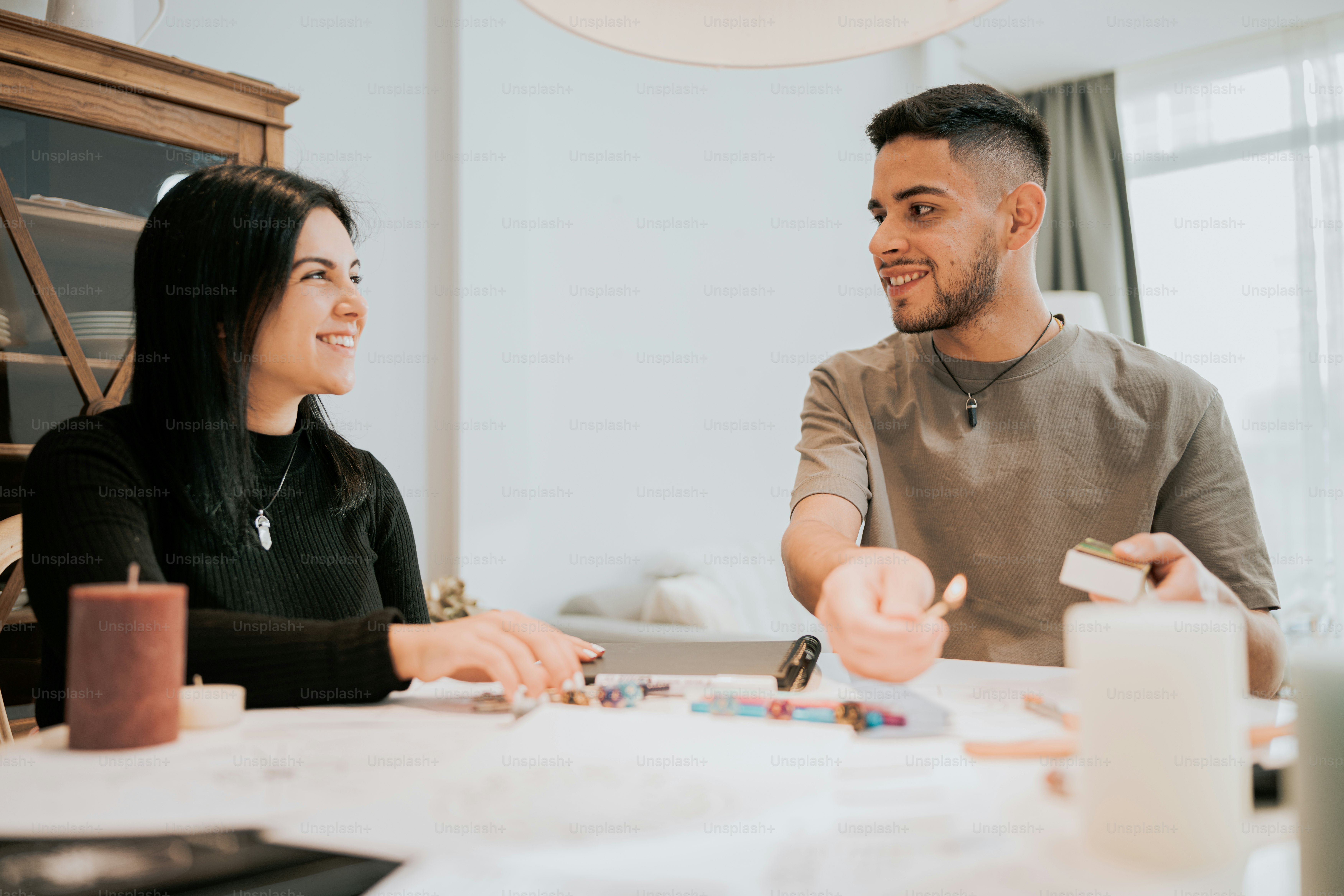 a man and a woman sitting at a table