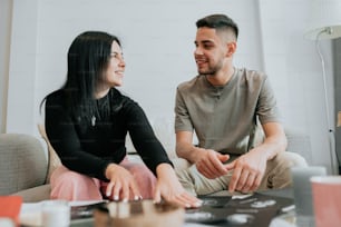 a man and a woman sitting on a couch