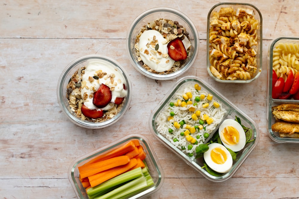 a variety of food items are arranged on a table