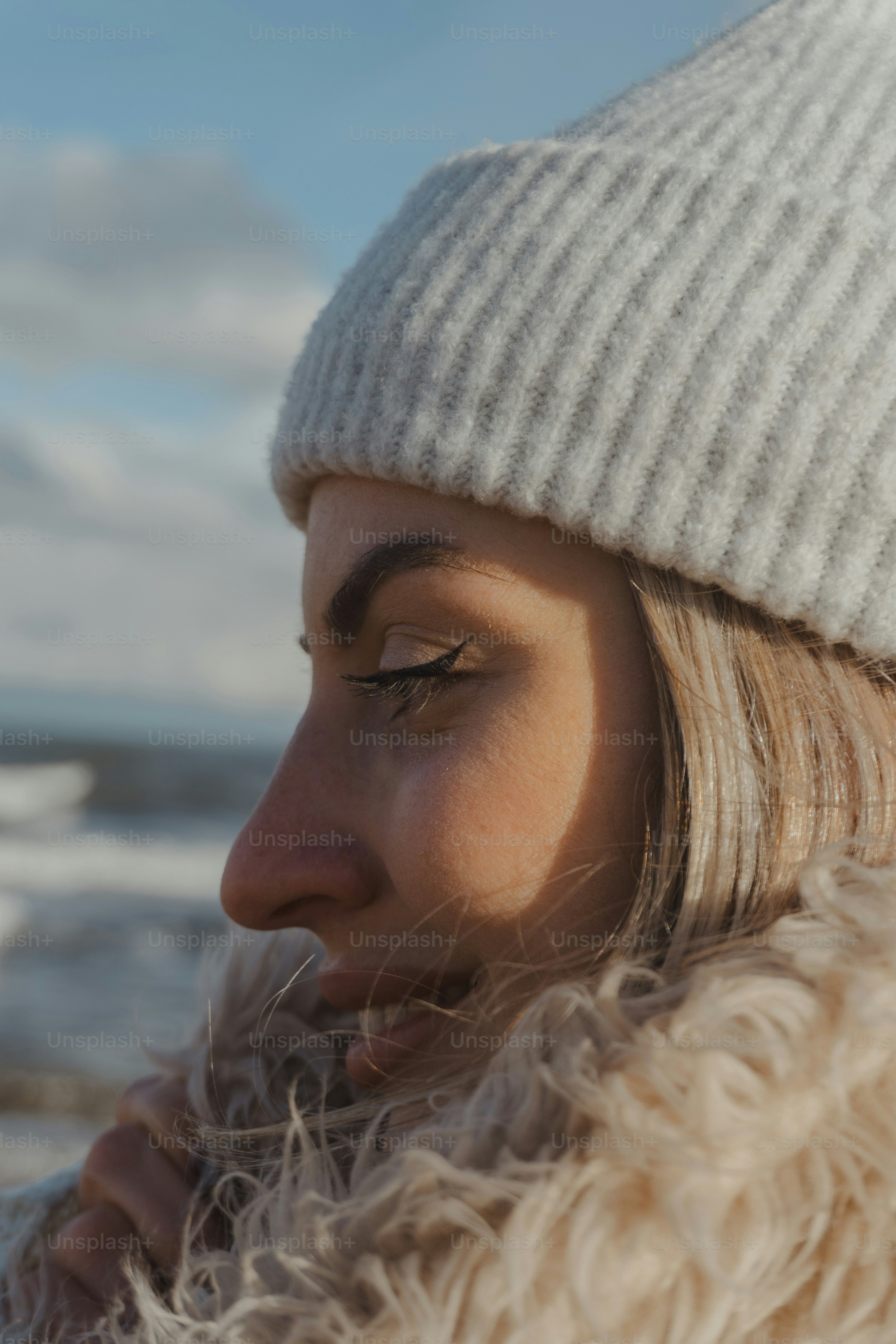 a close up of a person wearing a hat