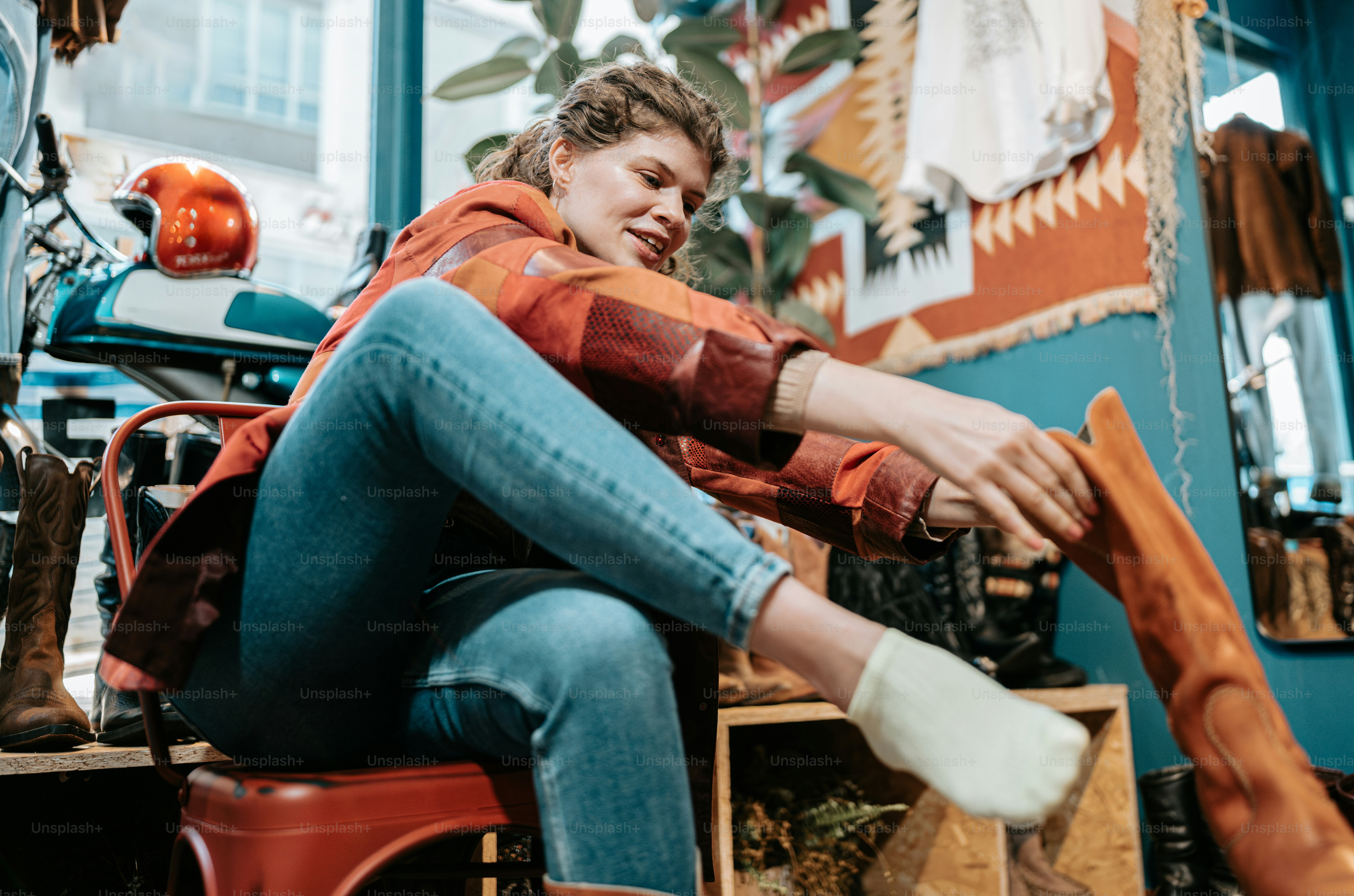 a woman sitting on a chair with her legs crossed