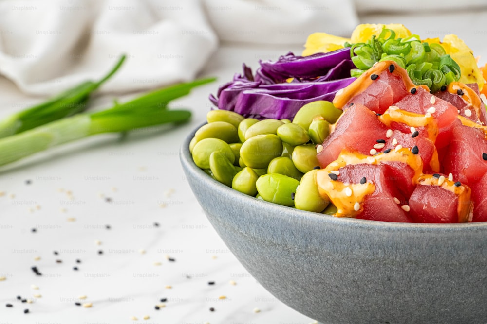 a close up of a bowl of food on a table