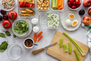 a table topped with lots of different types of food