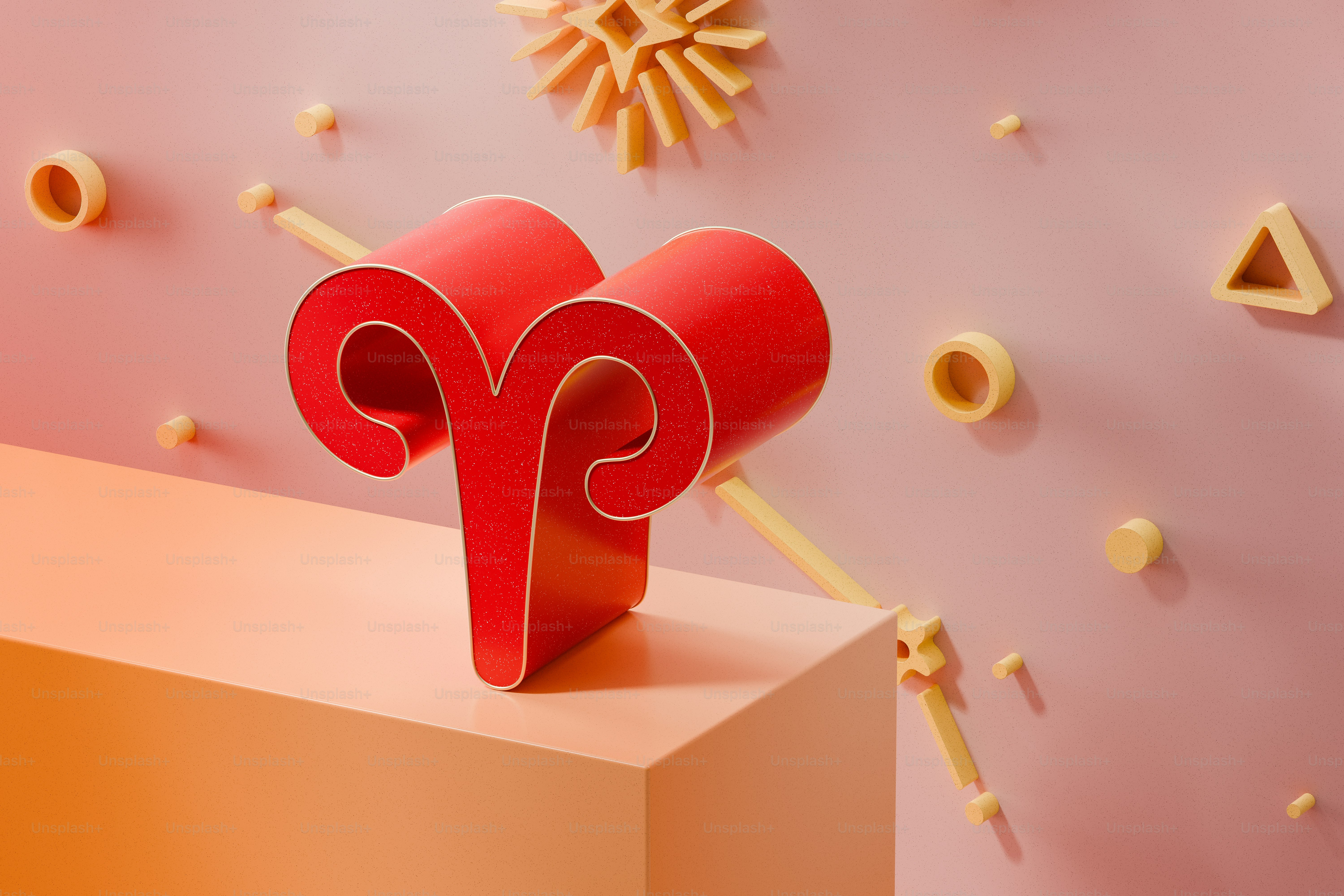 una escultura de papel de un carnero sobre un fondo rosa