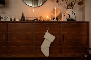 a christmas stocking hanging on a dresser