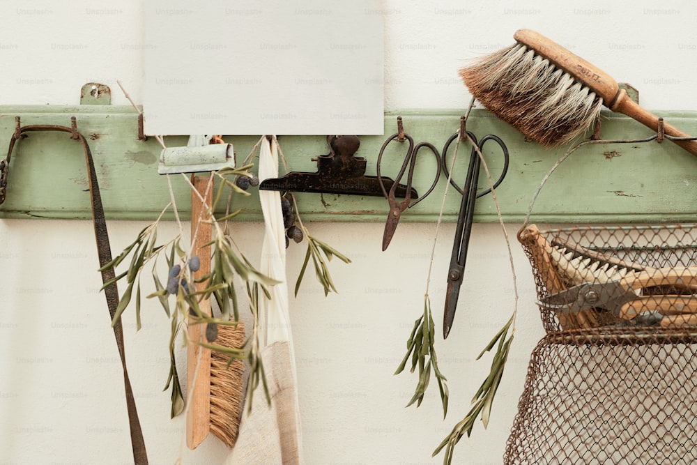 a bunch of tools hanging on a wall