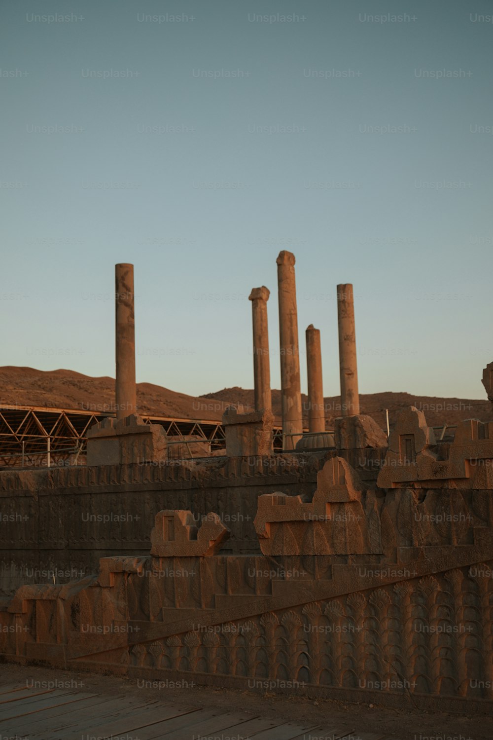 a view of a desert with some ruins