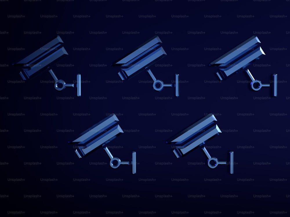 a set of security cameras on a dark background