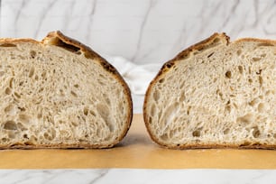 a close up of two pieces of bread